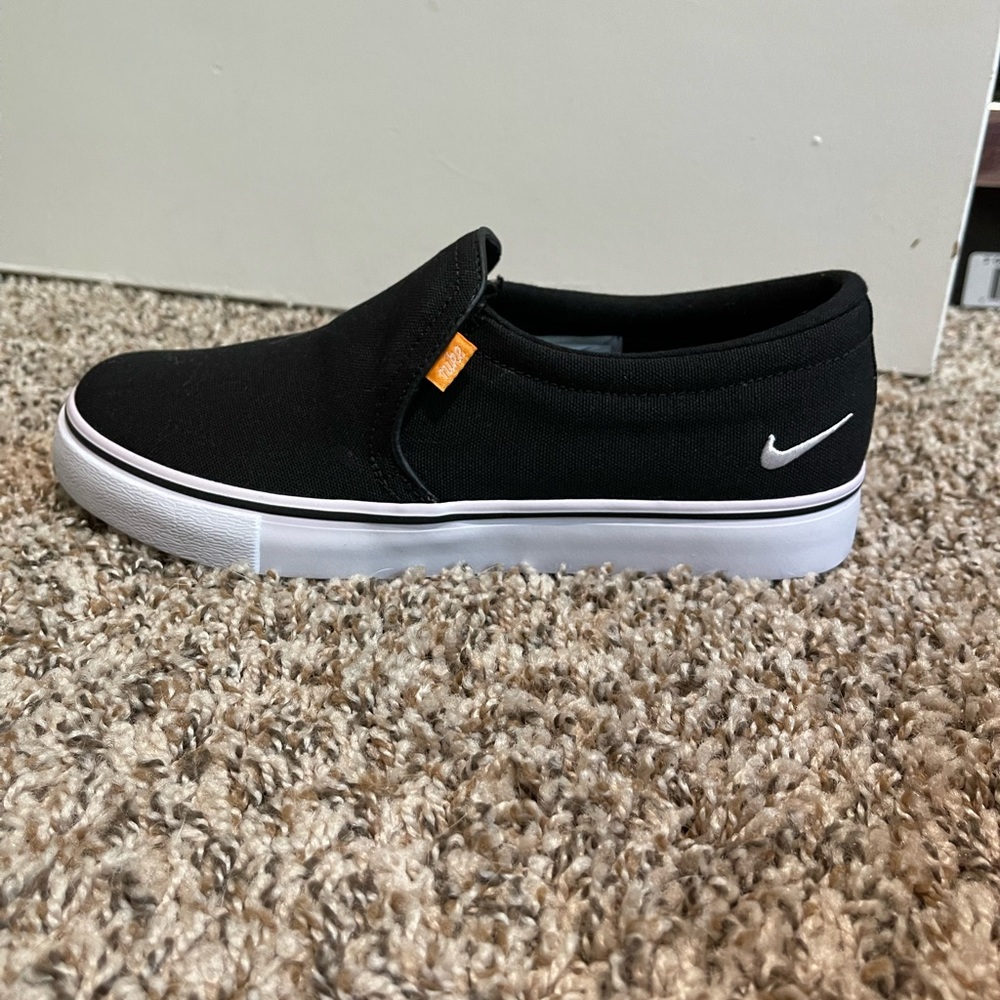 Womens Nike Court Royale slip ons in black